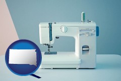 south-dakota map icon and sewing machine